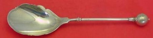Wendt Sterling Silver Ball End Scalloped Serving Spoon 10 1/4": Wendt Sterling Silver Ball End Scalloped Serving Spoon 10 1/4" This exquisite serving spoon showcases the elegant Ball End pattern by Wendt, crafted from high-quality sterling silver. The spoon featur