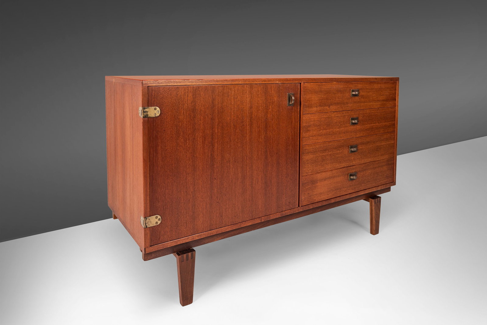 Mid-Century Danish Modern Teak Sideboard by Peter Lovig Nielsen 1950s: Mid-Century Danish Modern Teak Sideboard by Peter Lovig Nielsen 1950s Discover the elegance of this Danish Modern Teak 4-Drawer Sideboard, designed by Peter Lovig Nielsen for Dansk Designs in the 1950