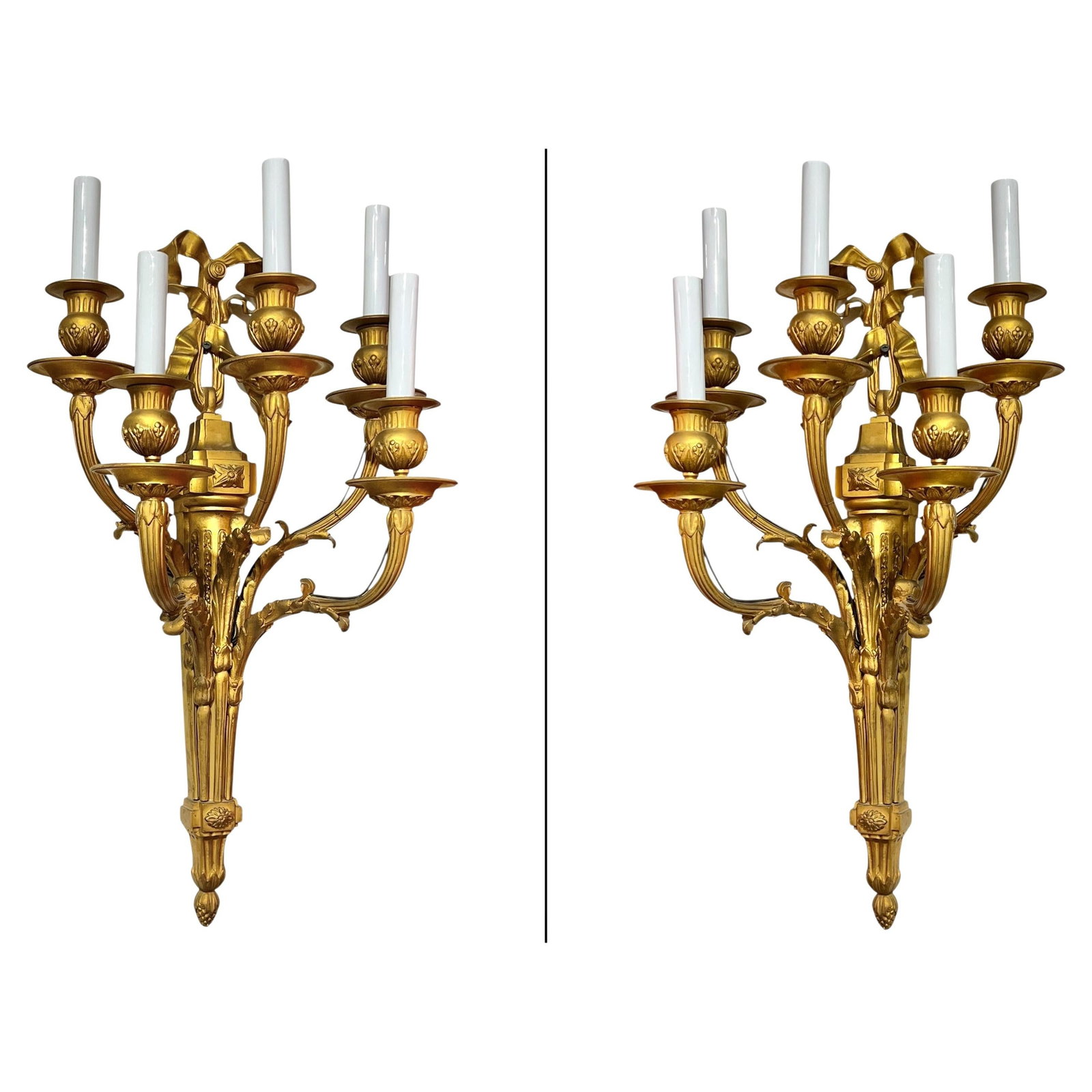 Set of Two Antique French Gilt Bronze Five-Light Louis XVI Sconces: Set of Two Antique French Gilt Bronze Five-Light Louis XVI Sconces Pair of large 19th-century French Louis XVI style wall sconces crafted in gilt bronze. Each sconce features five electrified candelab