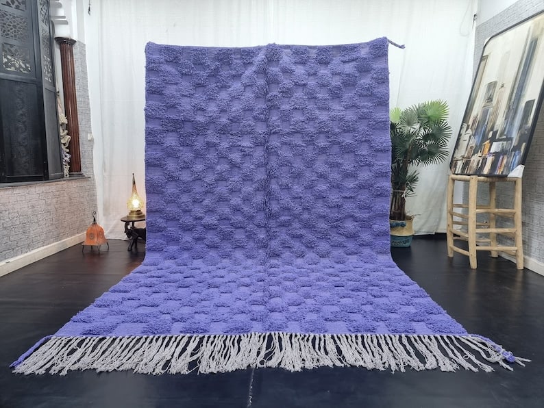 Authentic Blue Engraved Rug Handwoven in Morocco 100% Wool 8 x 5 Feet: Authentic Blue Engraved Rug Handwoven in Morocco 100% Wool 8 x 5 Feet Discover the charm of this authentic Blue Engraved Rug, handwoven by local Berber women weavers in the Atlas Mountains. Crafted us