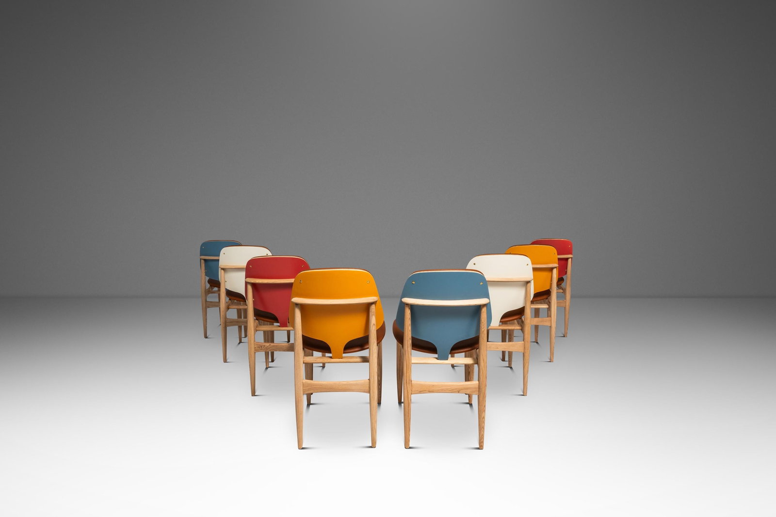 Set of Eight Elliots of Newbury Oak Dining Chairs in Arne Vodder Style England 1960s: Set of Eight Elliots of Newbury Oak Dining Chairs in Arne Vodder Style England 1960s This rare set of eight Mid-Century Modern dining chairs was produced by Elliots of Newbury in England during the 19