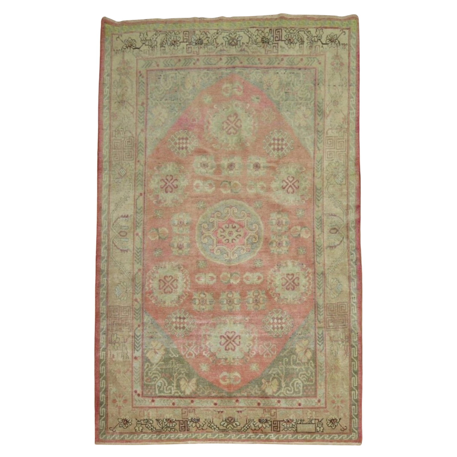 Antique Khotan Rug Pink Yin Yang Design Wool East Turkestan 1920: Antique Khotan Rug Pink Yin Yang Design Wool East Turkestan 1920 This exquisite one-of-a-kind Khotan rug, dating back to the early 20th century (circa 1920), features a soft pink field adorned with a 
