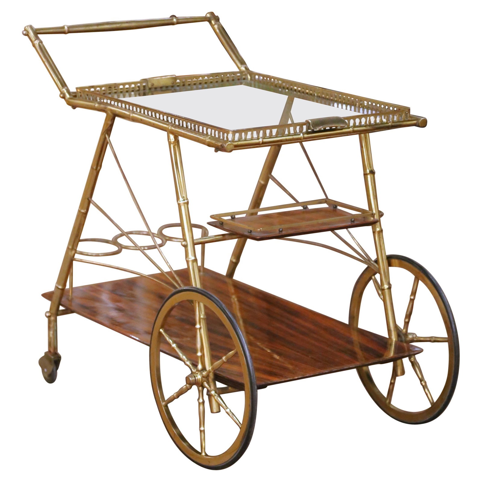 French Faux Bamboo Brass and Mahogany Bar Cart with Removable Glass Tray: French Faux Bamboo Brass and Mahogany Bar Cart with Removable Glass Tray This mid-century French bar cart, crafted circa 1960, showcases a gilt-brass faux bamboo frame paired with polished mahogany ti