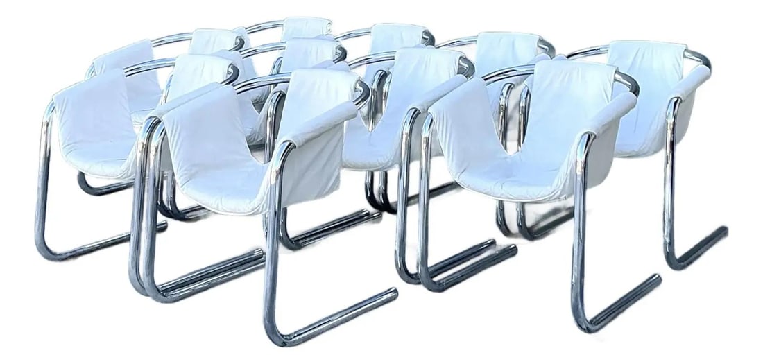 Set of 10 Zermatt Leather Sling Dining Chairs by Vecta: Set of 10 Zermatt Leather Sling Dining Chairs by Vecta This set of ten "Zermatt" dining chairs by Vecta, designed by Duncan Burke and Gunter Eberle, showcases striking postmodern design. Each chair fe
