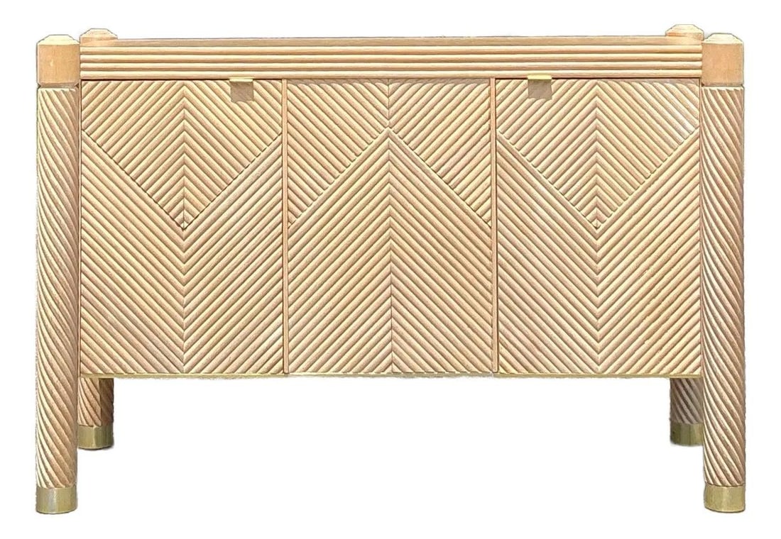 Vintage Boho Chevron Rattan Credenza with Brass Feet: Vintage Boho Chevron Rattan Credenza with Brass Feet Enhance your living space with the Vintage Boho Chevron Rattan Credenza, a stunning blend of Art Deco-inspired design and organic charm. The door f