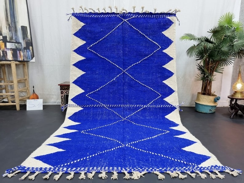 Authentic Handwoven Blue Rug 100% Wool Morocco 10 x 5 Feet: Authentic Handwoven Blue Rug 100% Wool Morocco 10 x 5 Feet Discover the beauty of this stunning authentic blue rug, handwoven in the Atlas Mountains by local Berber women weavers. Crafted using tradit