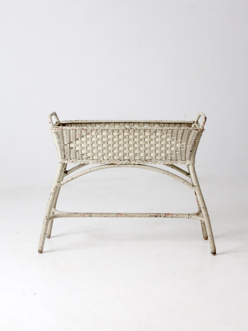 Vintage Antique Wicker Planter with Elegant Legs 40.5 x 12.5 x 31: Vintage Antique Wicker Planter with Elegant Legs 40.5 x 12.5 x 31 Add a touch of vintage charm to your home with this antique painted wicker planter. Featuring a beautifully woven top with built-in le