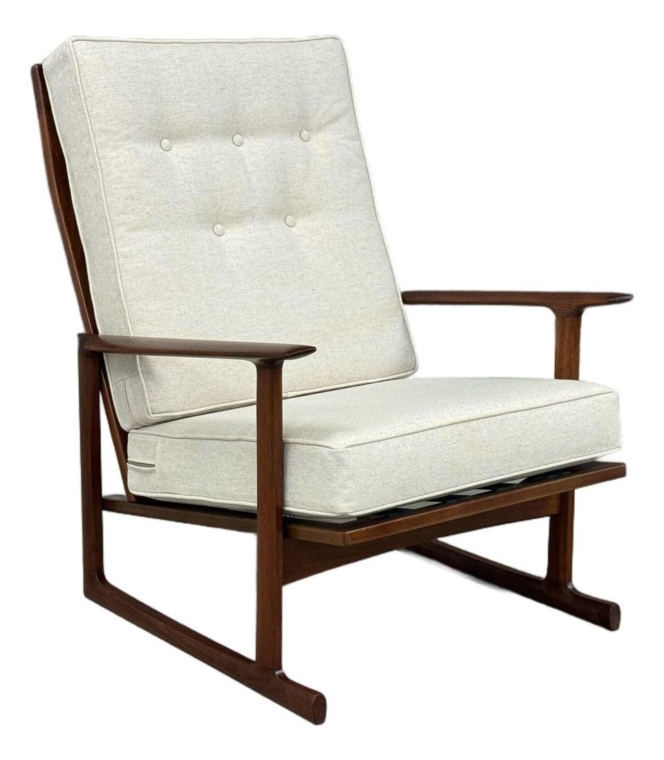 1950s Ib Kofod Larsen Danish Modern Lounge Chair Walnut Frame: 1950s Ib Kofod Larsen Danish Modern Lounge Chair Walnut Frame Experience the elegance of mid-century design with this 1950s Ib Kofod Larsen Danish Modern Lounge Chair. Featuring a beautifully crafted