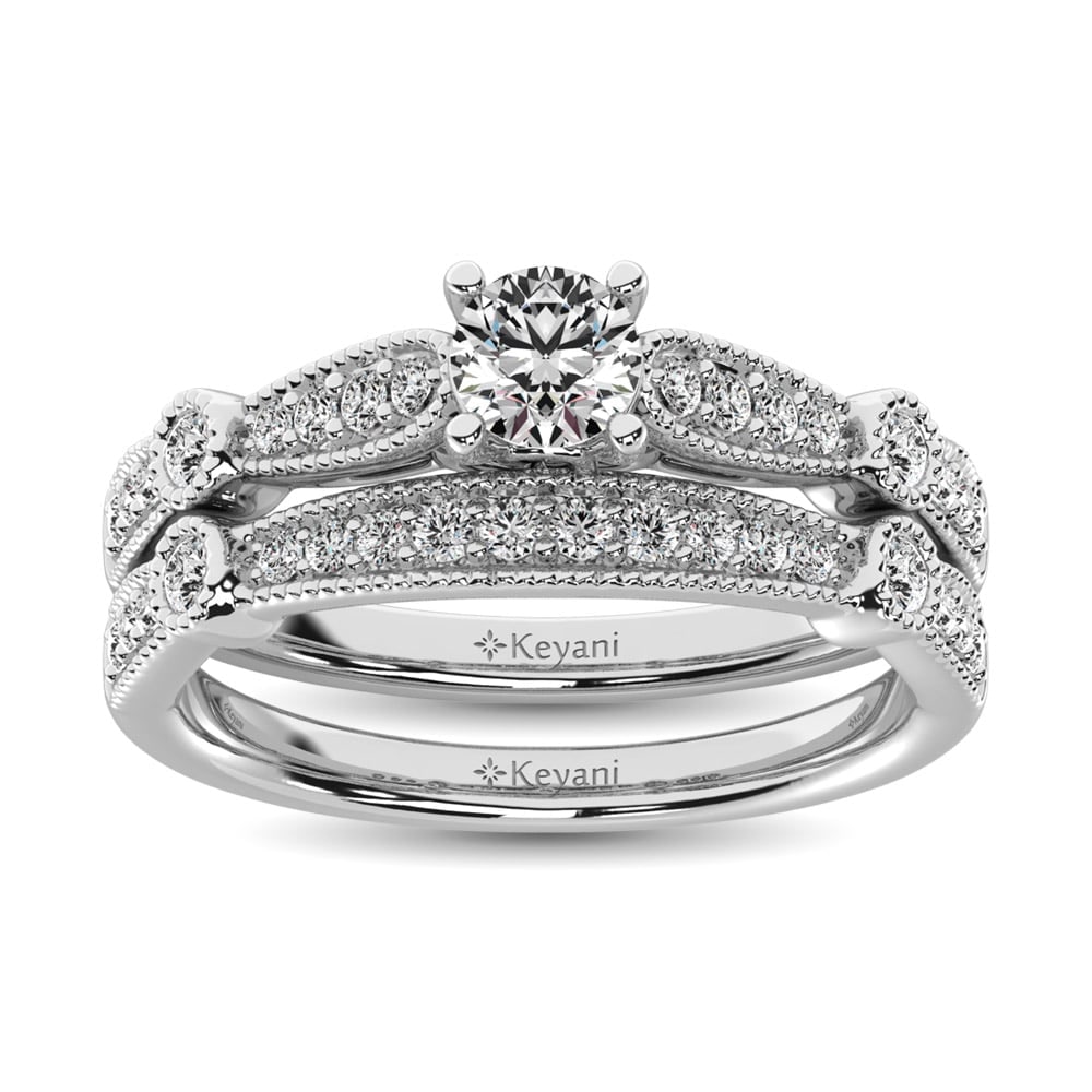 Diamond 1/2 Ct.Tw. Bridal Ring in 14K White Gold: Diamond 1/2 Ct.Tw. Bridal Ring in 14K White Gold 14k White Gold Stone Color: G-h Stone Clarity: Si2 Each ring is presented in standard size 6.5. Complimentary resizing is available between sizes 510 (