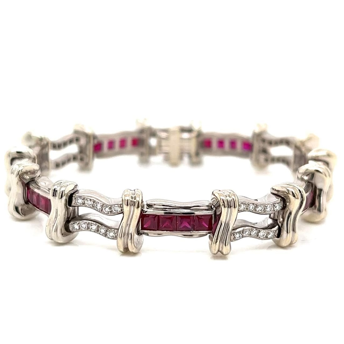 Kurt Wayne 18K White Gold Ruby Diamond Bracelet 70 Diamonds 28 Rubies: Kurt Wayne 18K White Gold Ruby Diamond Bracelet 70 Diamonds 28 Rubies This stunning bracelet features 18K white gold adorned with 70 sparkling diamonds, totaling approximately 1.50 carats, exhibiting 