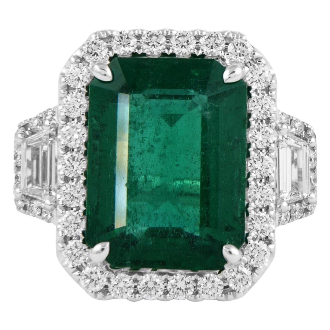 GIA 7.99ct Emerald Diamond 3-Stone Ring 18k White Gold: GIA 7.99ct Emerald Diamond 3-Stone Ring 18k White Gold This exquisite 3-stone ring features a stunning 7.99 ct emerald at its center, complemented by a halo of diamonds, all set in luxurious 18k white