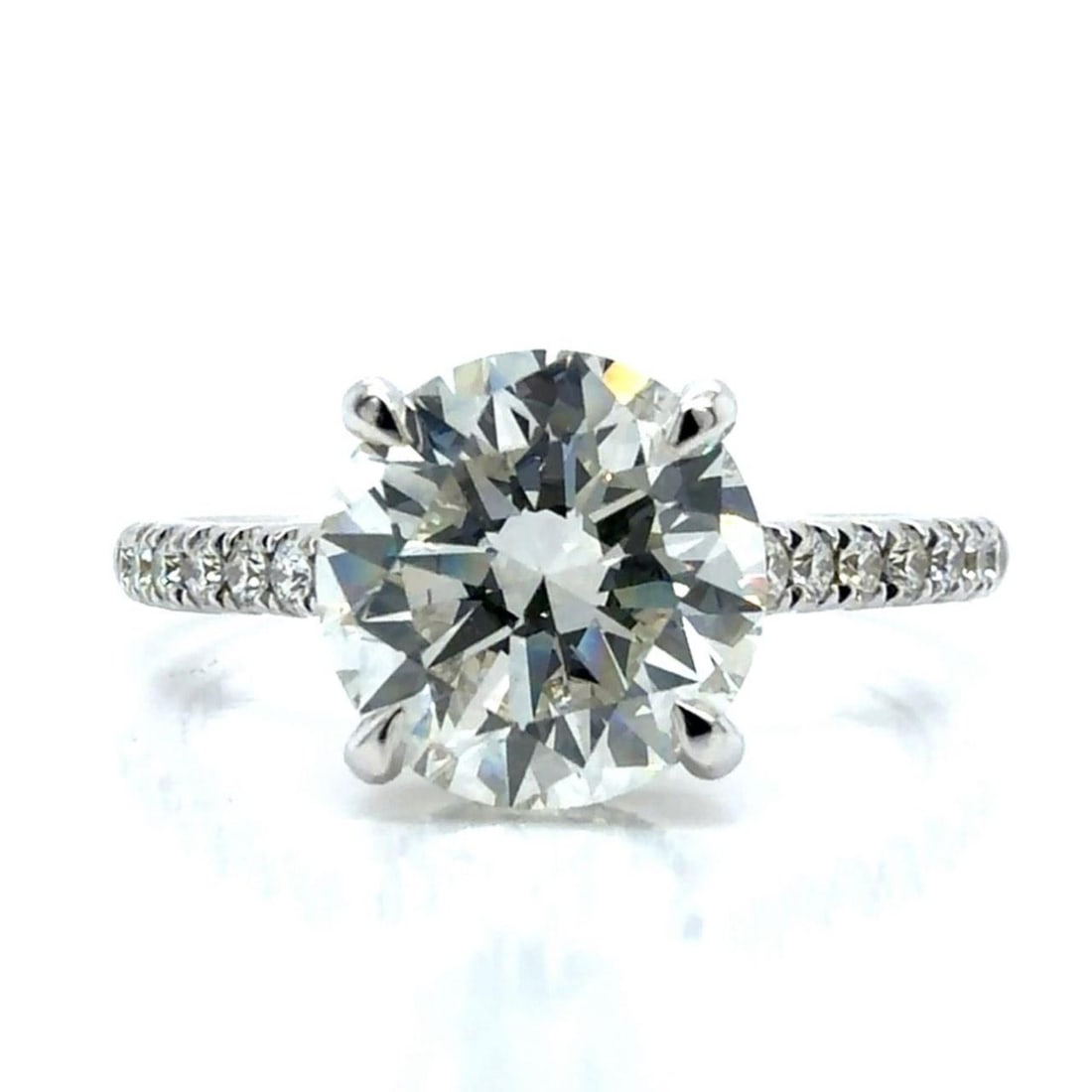 GIA 2.20 Ct I VS1 Diamond Ring in 18K White Gold Size 6.5: GIA 2.20 Ct I VS1 Diamond Ring in 18K White Gold Size 6.5 This elegant ring features a 2.20 carat GIA-certified diamond set in 18K white gold. The center diamond has an I color and VS1 clarity, measur