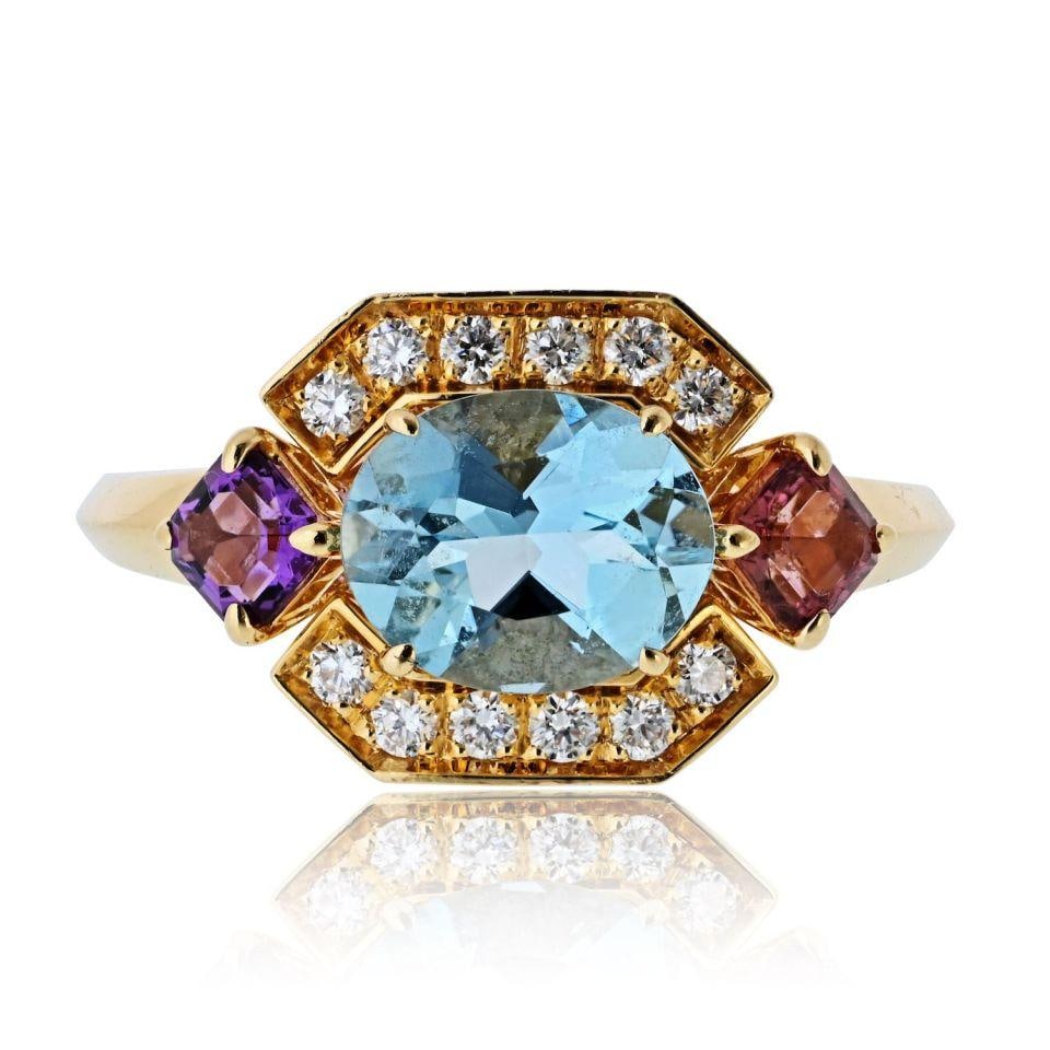 Bvlgari 18K Yellow Gold Allegra Ring with Aquamarine Amethyst Tourmaline: Bvlgari 18K Yellow Gold Allegra Ring with Aquamarine Amethyst Tourmaline This exquisite Bvlgari Allegra ring is crafted in luxurious 18K yellow gold, featuring a stunning combination of aquamarine, am
