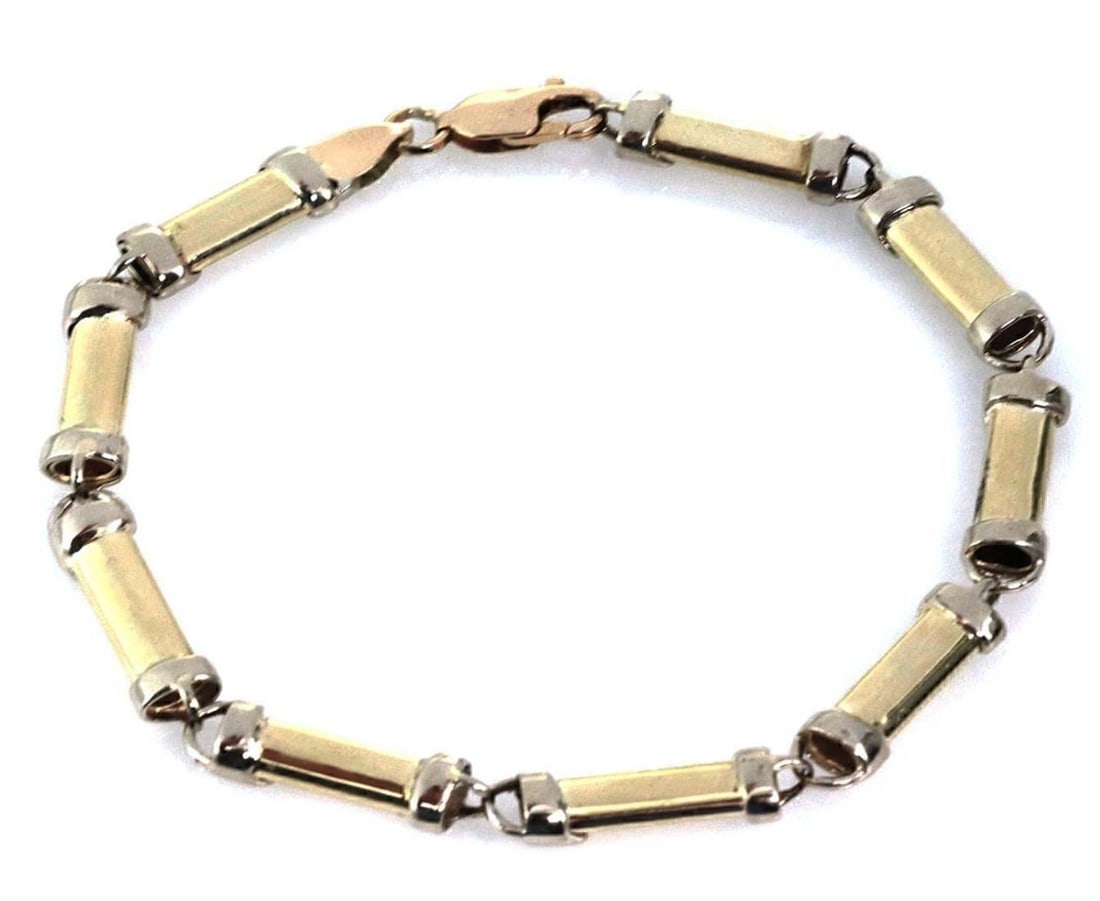 Vintage 14k Yellow and White Gold Long Tube Link Bracelet: Vintage 14k Yellow and White Gold Long Tube Link Bracelet This vintage link bracelet features a long tube design crafted from 14k two tone gold, combining both yellow and white gold for a classic and 
