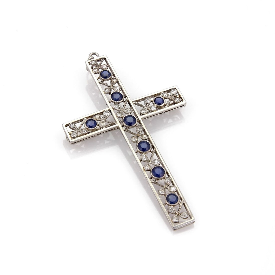 Vintage Platinum Brooch Pendant with Sapphires and Diamonds Floral Cross Motif: Vintage Platinum Brooch Pendant with Sapphires and Diamonds Floral Cross Motif This vintage floral cross pendant brooch is expertly crafted from solid platinum and features an elegant cross motif with