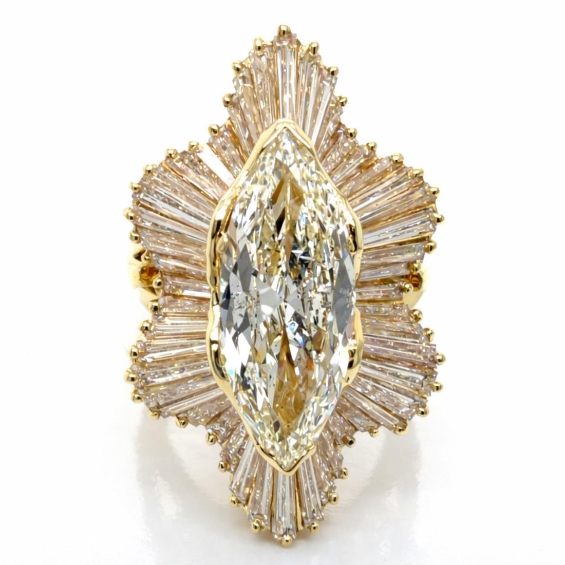 Convertible 18K Gold Ring Pendant with 4.52 Ct Marquise Diamond and 48 Accents: Convertible 18K Gold Ring Pendant with 4.52 Ct Marquise Diamond and 48 Accents This versatile piece crafted in 18K yellow gold features a 4.52 carat marquise diamond of K color and SI2 clarity, comple