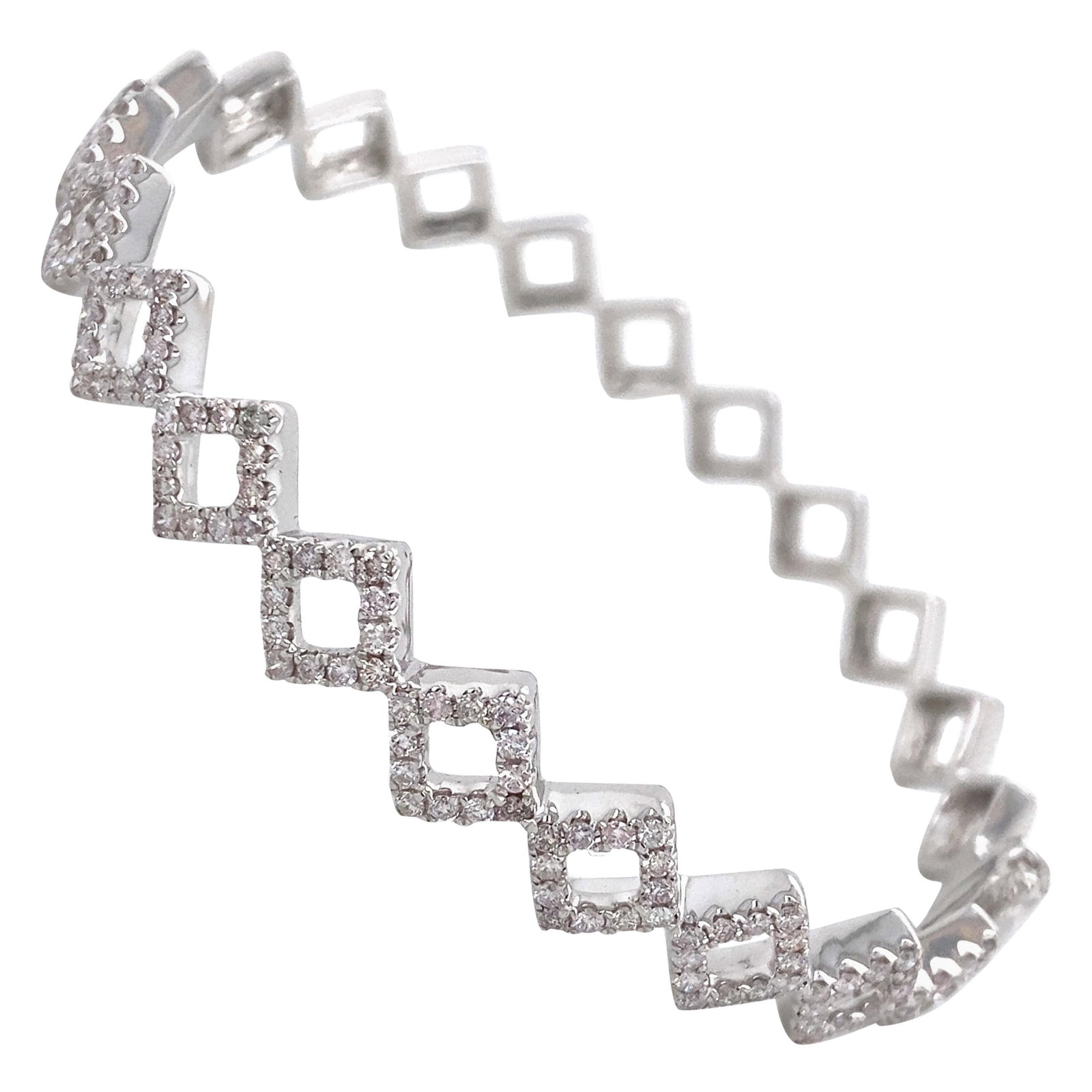 1.20ct Diamond Bangle Bracelet 18k White Gold Contemporary: 1.20ct Diamond Bangle Bracelet 18k White Gold Contemporary This exquisite 1.20 ct Diamond Bangle Bracelet is crafted from 18k white gold, showcasing a contemporary design. The bracelet features 120 ro