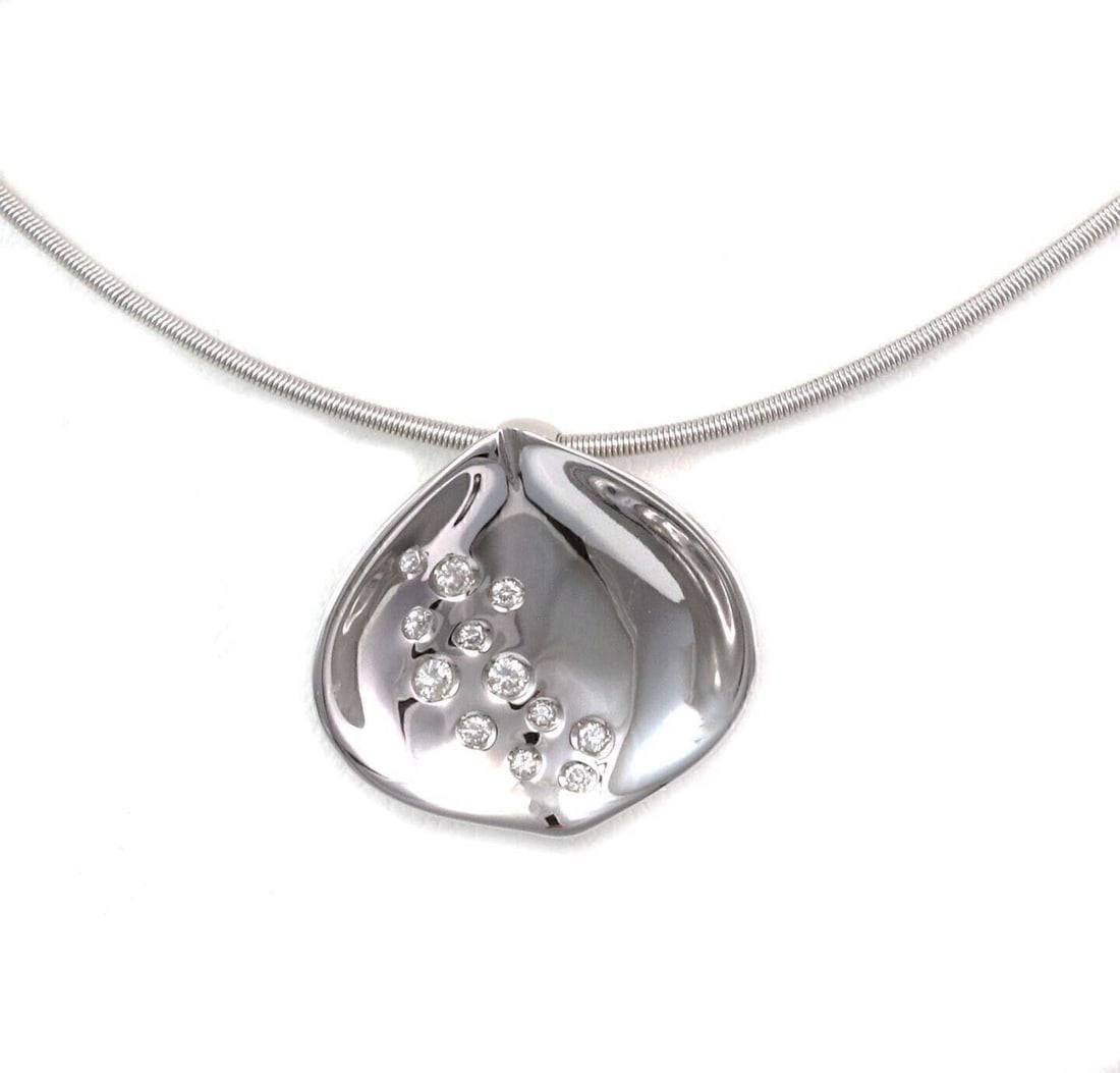 Koesia 18k White Gold Diamond Leaf Choker Necklace with Concave Pendant: Koesia 18k White Gold Diamond Leaf Choker Necklace with Concave Pendant This Koesia necklace features a concave leaf pendant adorned with 0.08 carats of diamonds, crafted in 18k white gold. The neckla