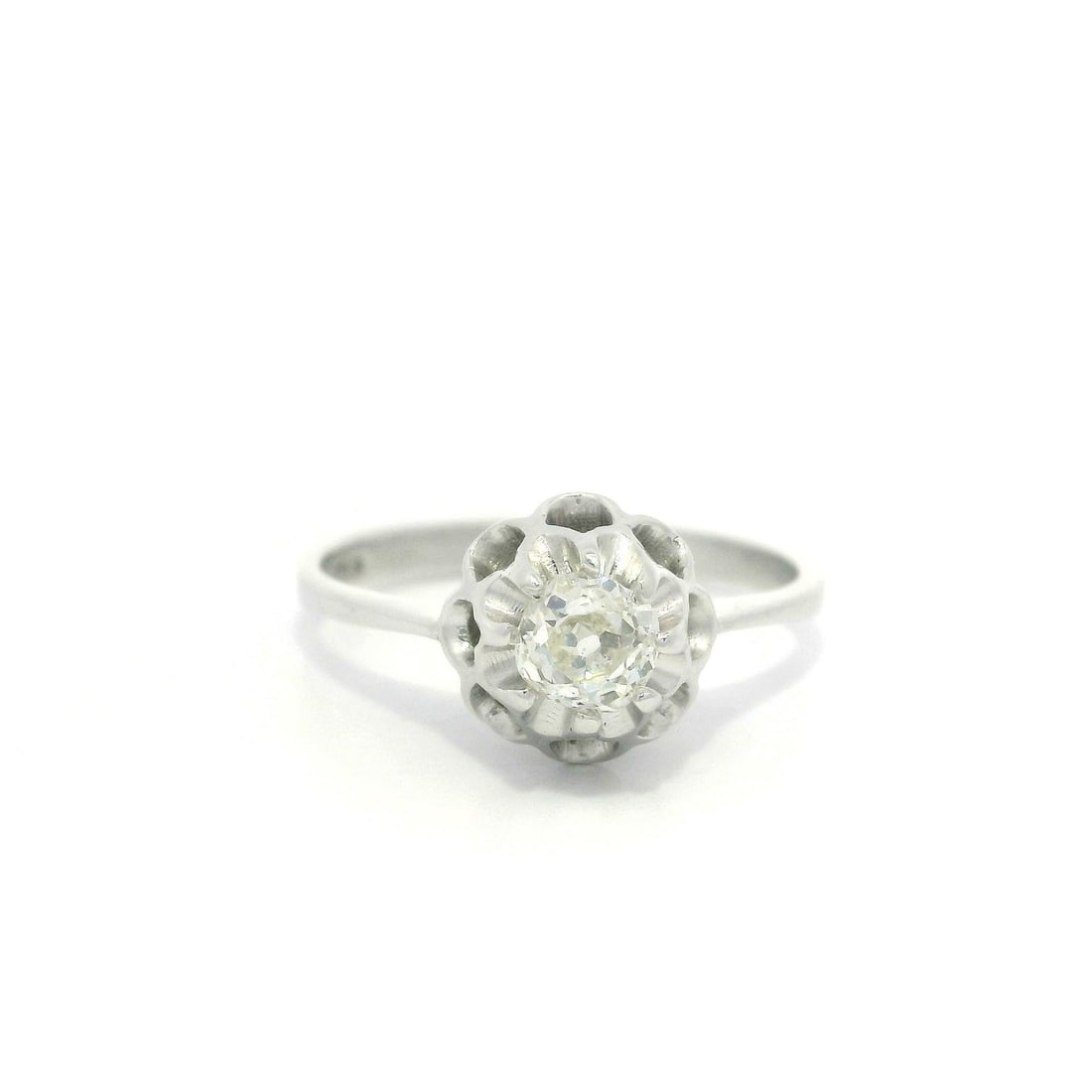 Antique 18k White Gold Buttercup Diamond Solitaire Ring 0.37ctw VS2: Antique 18k White Gold Buttercup Diamond Solitaire Ring 0.37ctw VS2 This stunning antique ring features a beautiful .37 carat total weight Old Mine Cut diamond set in a classic buttercup prong setting