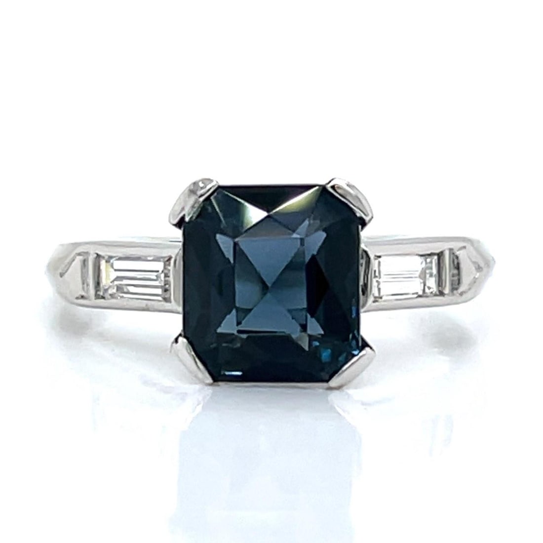 Platinum Art Deco Ring with 2.36 Ct Bellerophon Certified Spinel and Diamonds: Platinum Art Deco Ring with 2.36 Ct Bellerophon Certified Spinel and Diamonds This Art Deco ring is crafted from platinum and features a 2.36 carat Bellerophon certified spinel at its center. The ring