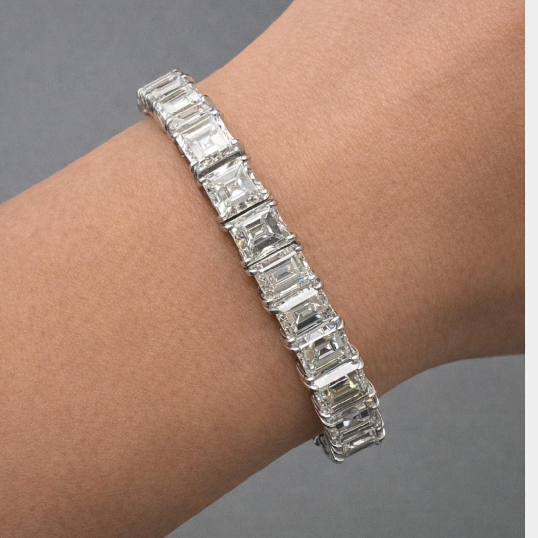 Platinum Art Deco Tennis Bracelet with 36 Carats Ascher Cut Diamonds: Platinum Art Deco Tennis Bracelet with 36 Carats Ascher Cut Diamonds This Art Deco platinum tennis bracelet features 33 graduated Asscher-cut diamonds with a total approximate weight of 36.00 carats. 