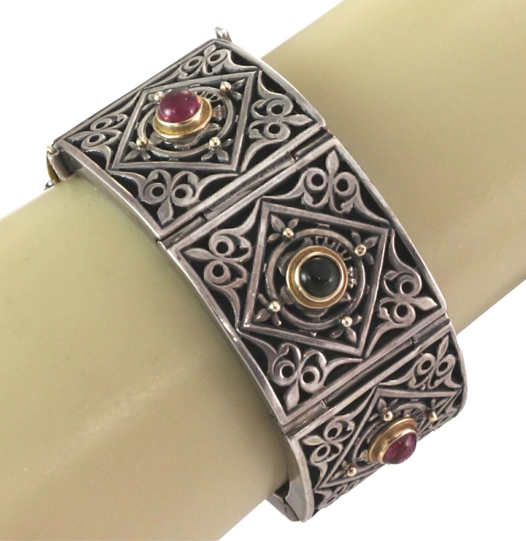 Tourmaline Gemstone Bangle in 18k Gold and Sterling by Konstantino: Tourmaline Gemstone Bangle in 18k Gold and Sterling by Konstantino This authentic Konstantino wide hinge bracelet is crafted from sterling silver with 18k yellow gold accents and features an intricate