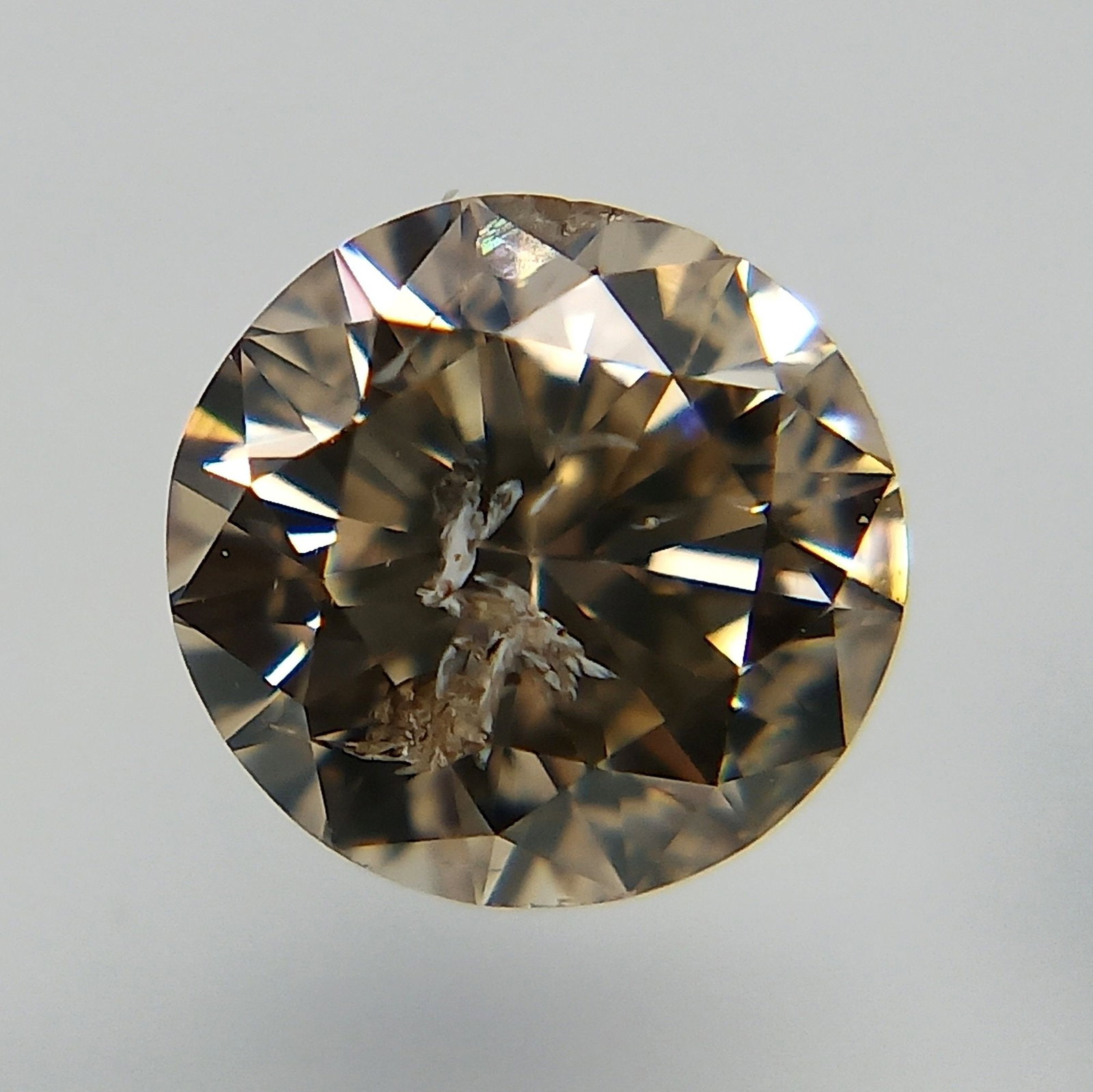 Loose Diamond - ROUND 0.5ct Light Brown I2: Loose Diamond - ROUND 0.5ct Light Brown I2 Source: Natural Shape: ROUND Carats: 0.5 Color: Light Brown Certification: EGL PLEASE NOTE: Framed, Large, or heavy items do not have shipping costs included