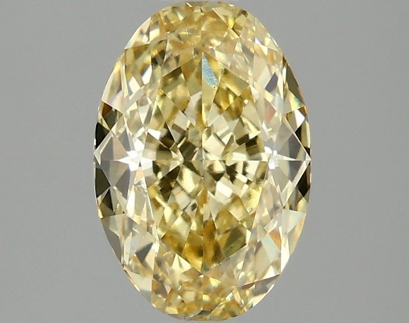 Loose Diamond - OVAL 2.1ct Fancy Intense Yellow VS1: Loose Diamond - OVAL 2.1ct Fancy Intense Yellow VS1 Source: This is a real non-mined Diamond that has been grown in a lab Shape: OVAL Carats: 2.1 Color: Fancy Intense Yellow Certification: IGI Video: