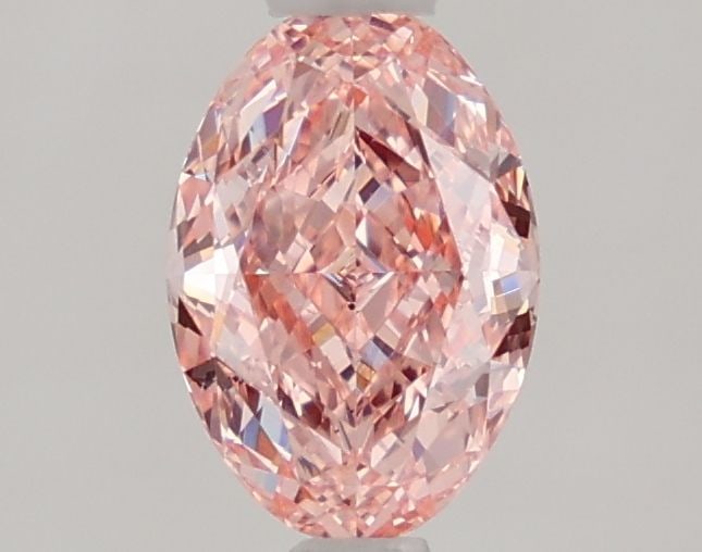 Loose Diamond - OVAL 1.02ct Fancy Vivid Pink VVS2: Loose Diamond - OVAL 1.02ct Fancy Vivid Pink VVS2 Source: This is a real non-mined Diamond that has been grown in a lab Shape: OVAL Carats: 1.02 Color: Fancy Vivid Pink Certification: IGI Video: