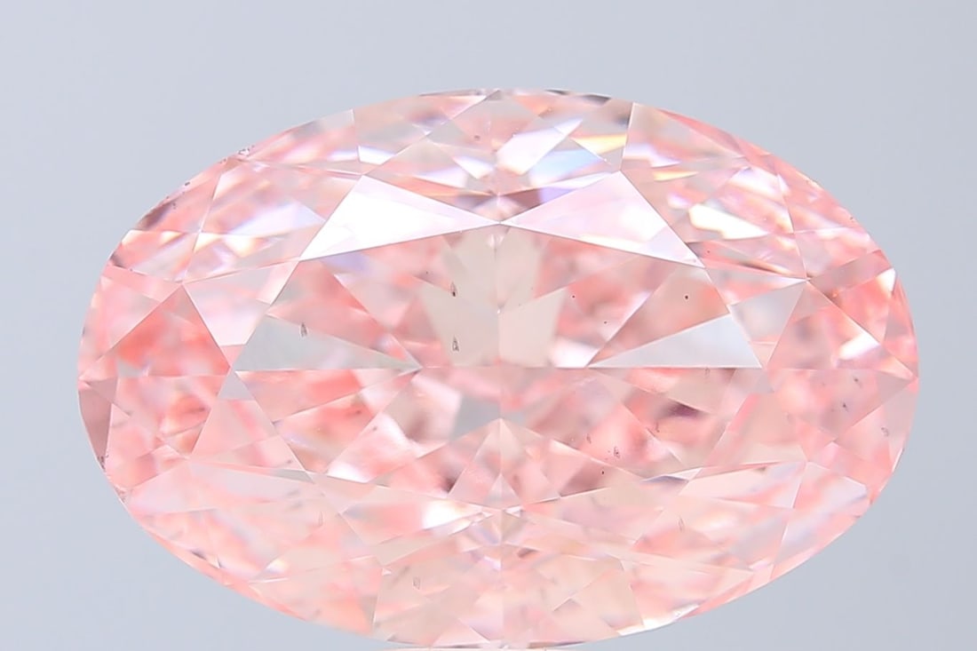 Loose Diamond - OVAL 20.07ct Fancy Vivid Pink VS2: Loose Diamond - OVAL 20.07ct Fancy Vivid Pink VS2 Source: This is a real non-mined Diamond that has been grown in a lab Shape: OVAL Carats: 20.07 Color: Fancy Vivid Pink Certification: IGI Video: