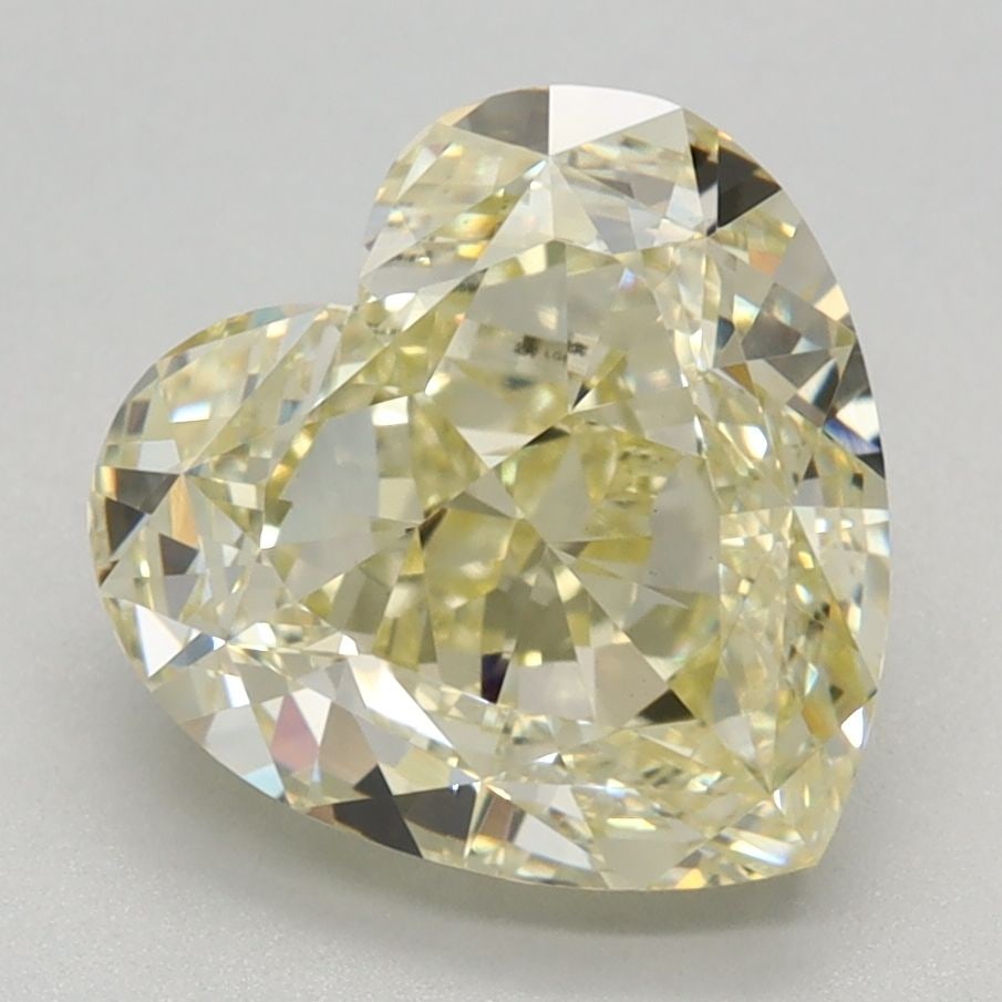 Loose Diamond - HEART 3.03ct Fancy Yellow VVS2: Loose Diamond - HEART 3.03ct Fancy Yellow VVS2 Source: This is a real non-mined Diamond that has been grown in a lab Shape: HEART Carats: 3.03 Color: Fancy Yellow Certification: IGI Video: