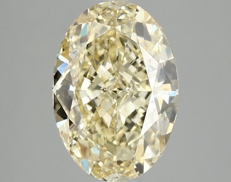 Loose Diamond - OVAL 3.09ct Fancy Vivid Yellow VS1: Loose Diamond - OVAL 3.09ct Fancy Vivid Yellow VS1 Source: This is a real non-mined Diamond that has been grown in a lab Shape: OVAL Carats: 3.09 Color: Fancy Vivid Yellow Certification: IGI Video: