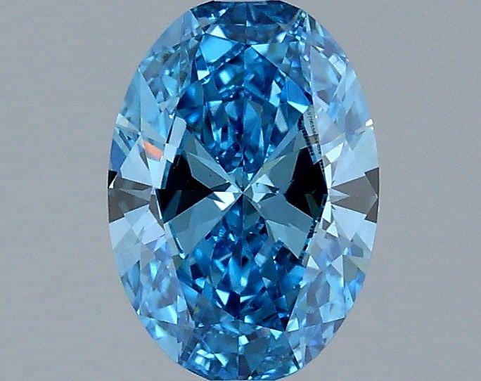 Loose Diamond - OVAL 1.0ct Fancy Vivid Blue VS2: Loose Diamond - OVAL 1.0ct Fancy Vivid Blue VS2 Source: This is a real non-mined Diamond that has been grown in a lab Shape: OVAL Carats: 1.0 Color: Fancy Vivid Blue Certification: IGI Video: