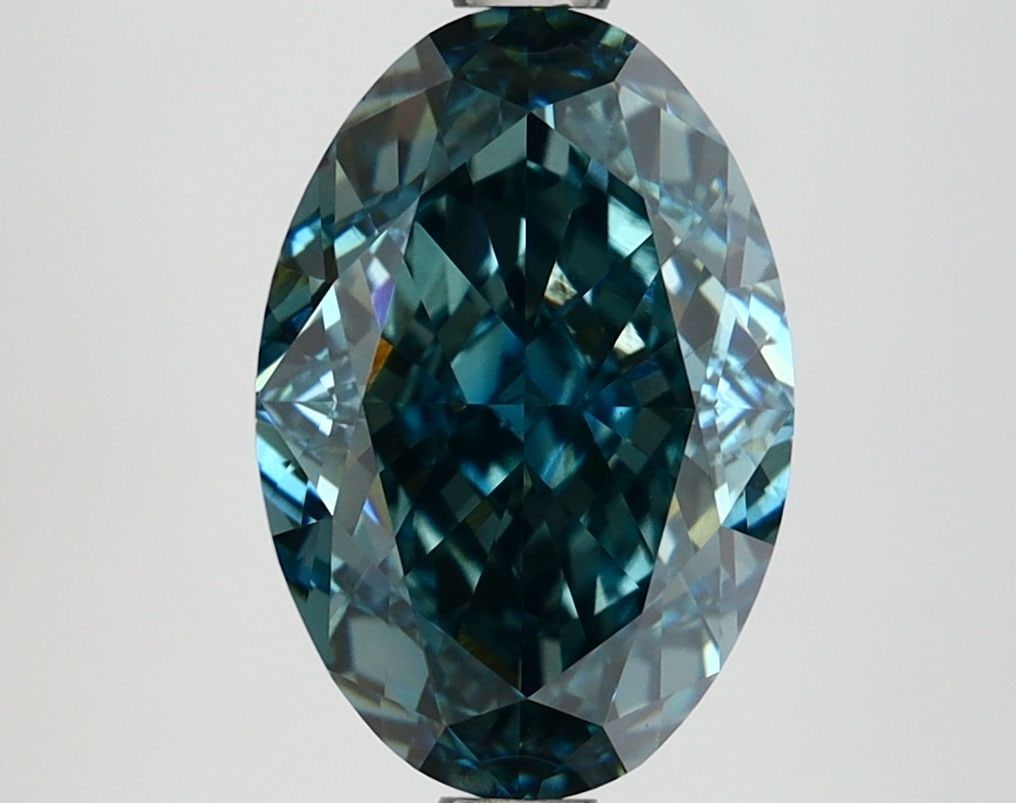 Loose Diamond - OVAL 3.02ct Fancy Vivid Green Blue VVS2: Loose Diamond - OVAL 3.02ct Fancy Vivid Green Blue VVS2 Source: This is a real non-mined Diamond that has been grown in a lab Shape: OVAL Carats: 3.02 Color: Fancy Vivid Green Blue Certification: IGI 