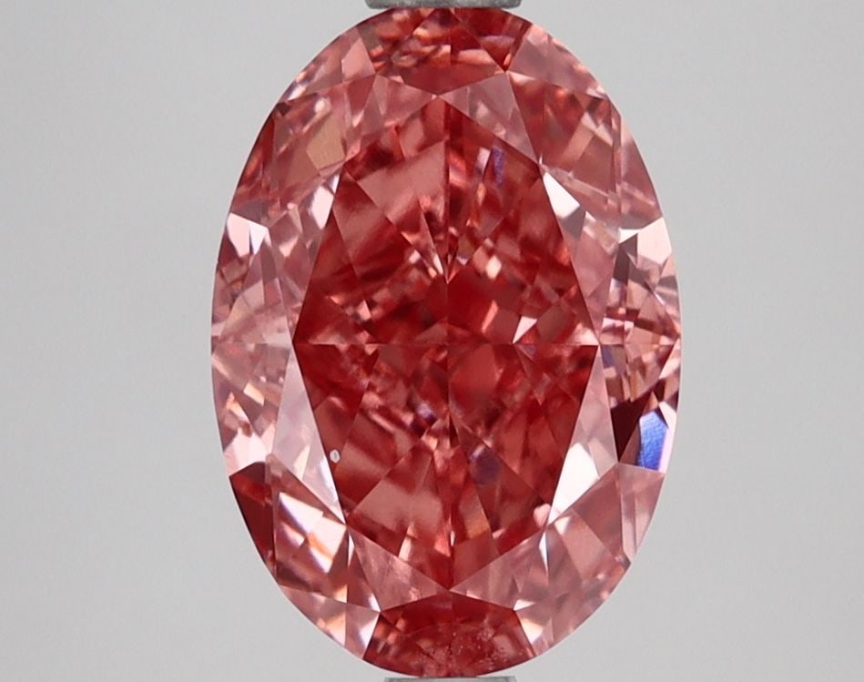 Loose Diamond - OVAL 2.7ct Fancy Vivid Pink VVS2: Loose Diamond - OVAL 2.7ct Fancy Vivid Pink VVS2 Source: This is a real non-mined Diamond that has been grown in a lab Shape: OVAL Carats: 2.7 Color: Fancy Vivid Pink Certification: IGI Video:
