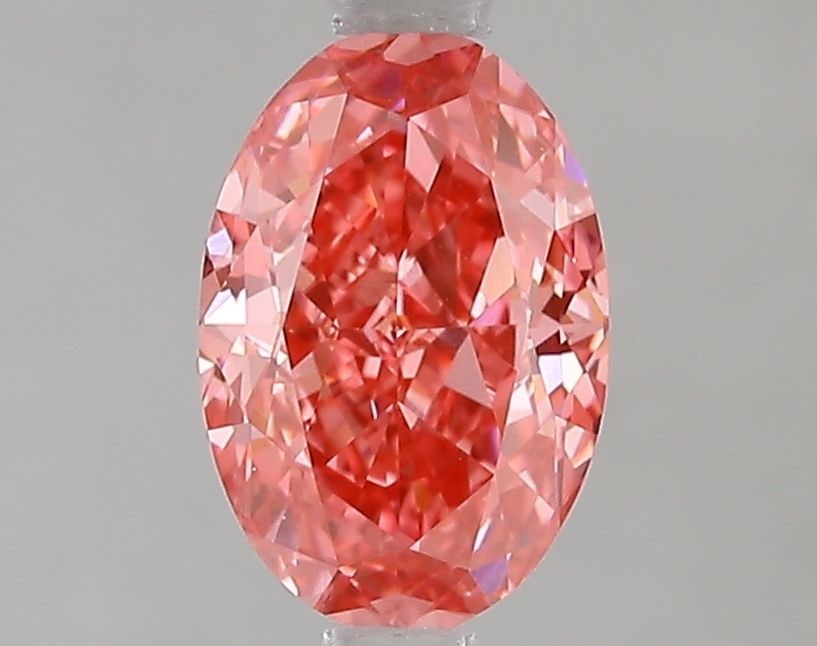 Loose Diamond - OVAL 1.52ct Fancy Vivid Pink VS1: Loose Diamond - OVAL 1.52ct Fancy Vivid Pink VS1 Source: This is a real non-mined Diamond that has been grown in a lab Shape: OVAL Carats: 1.52 Color: Fancy Vivid Pink Certification: IGI Video: