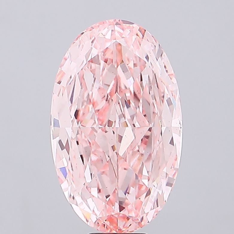 Loose Diamond - OVAL 14.77ct Fancy Vivid Pink VS2: Loose Diamond - OVAL 14.77ct Fancy Vivid Pink VS2 Source: This is a real non-mined Diamond that has been grown in a lab Shape: OVAL Carats: 14.77 Color: Fancy Vivid Pink Certification: IGI Video: