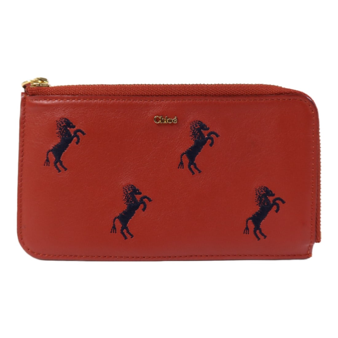 Red Calfskin Leather Card Case by Chloe with Gold Hardware: Red Calfskin Leather Card Case by Chloe with Gold Hardware This card case features red calfskin leather and is designed in a regular size. It is crafted in France and is in very good, un-used conditio