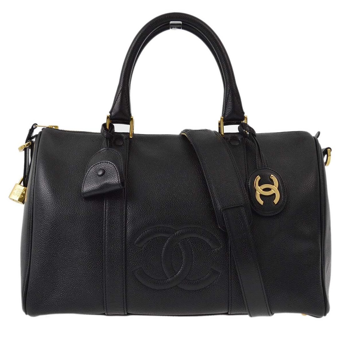 Chanel Black Caviar 2way Duffle Handbag with Gold Hardware: Chanel Black Caviar 2way Duffle Handbag with Gold Hardware This Chanel Black Calfskin 2way Duffle Handbag is a luxurious travel companion, crafted from high-quality caviar skin. It features a zip clos