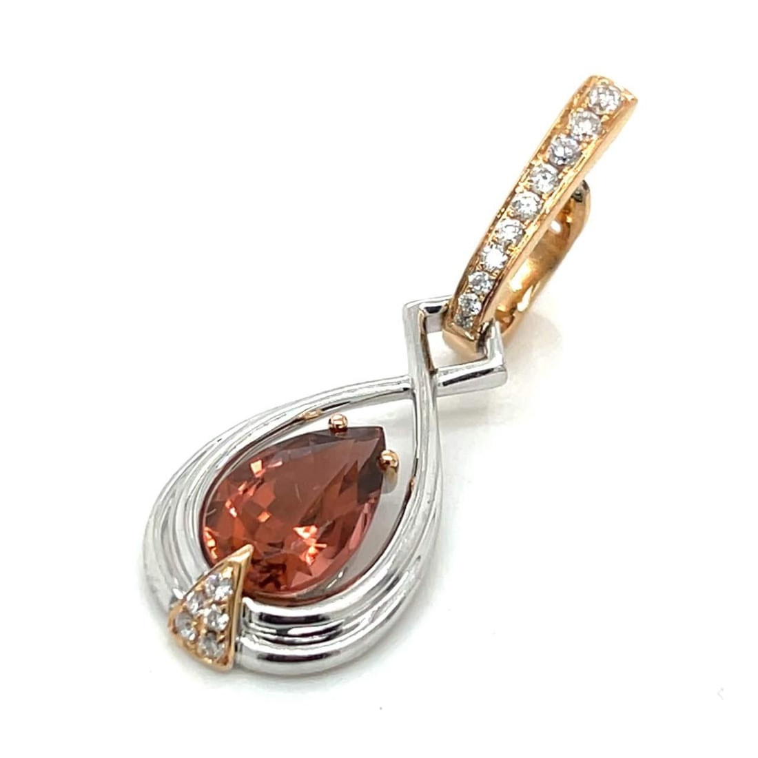 GIA Certified 3.73 Ct Tourmaline Diamond Pendant in 18k Gold: GIA Certified 3.73 Ct Tourmaline Diamond Pendant in 18k Gold This stunning pendant features a captivating 3.73 Ct. GIA Certified Tourmaline, elegantly set in a combination of 18k yellow and white gold