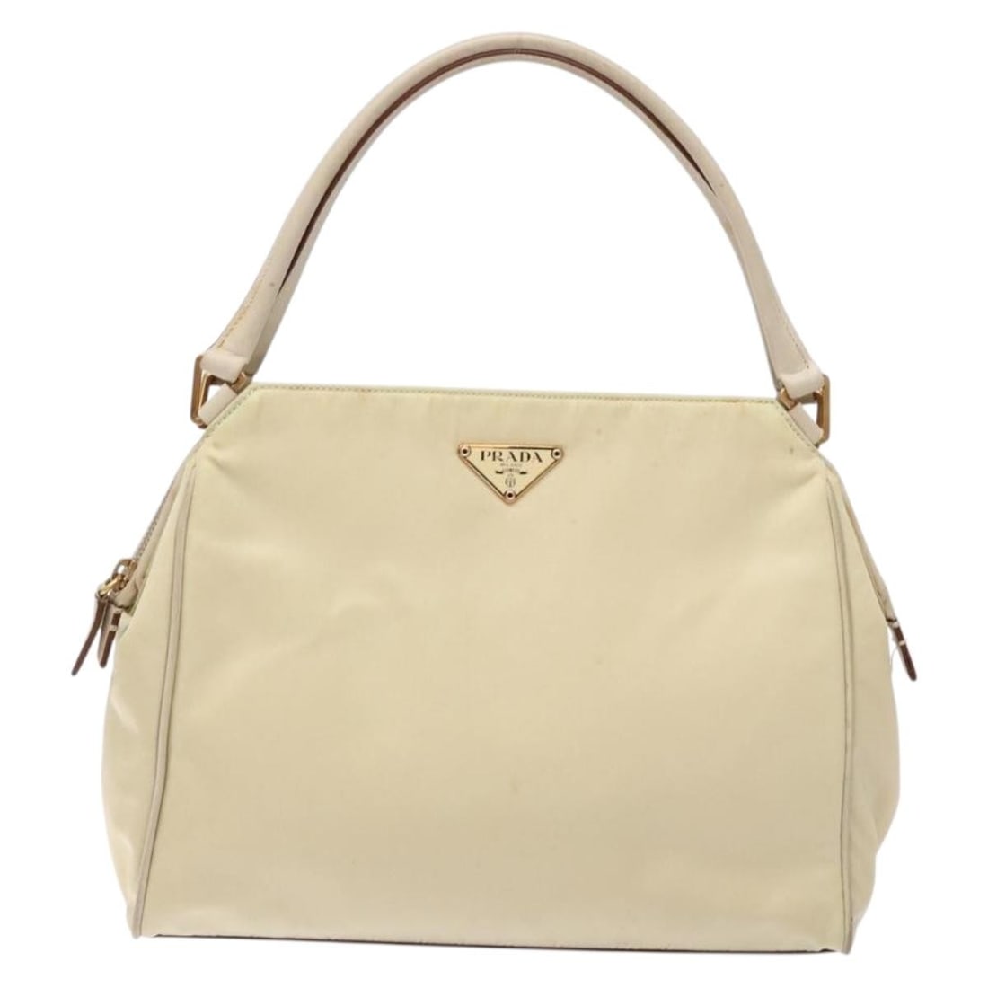 Beige Nylon Prada Vintage Women's Handbag 26cm by 21cm by 5cm: Beige Nylon Prada Vintage Women's Handbag 26cm by 21cm by 5cm This Prada vintage handbag for women features a beige nylon exterior with signs of wear including rubbing, stains, and loss of shape. The 