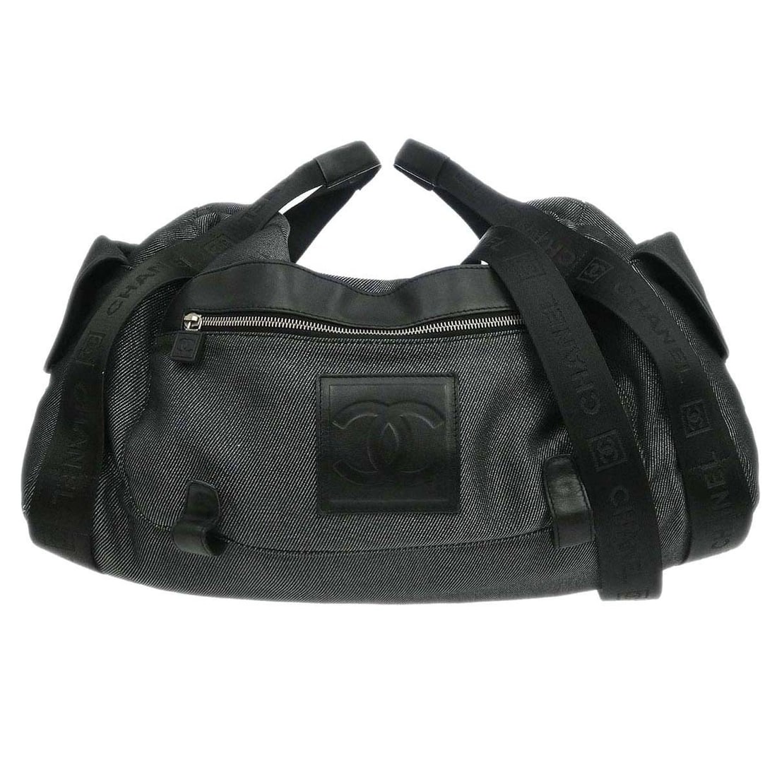 Chanel Sport Line Large Black Canvas Duffle Bag with Nylon Straps: Chanel Sport Line Large Black Canvas Duffle Bag with Nylon Straps This Chanel Sport Line duffle handbag features a black canvas and leather exterior with logo accents and a large, casual style. The ba