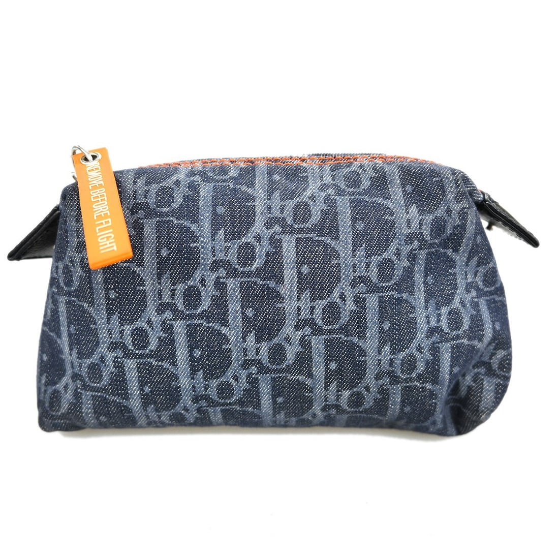 Dior Trotter Mini Navy Canvas Pouch with Zip Closure and Logo Accent: Dior Trotter Mini Navy Canvas Pouch with Zip Closure and Logo Accent This Christian Dior navy canvas Trotter cosmetic pouch features a compact mini size and showcases the signature logo pattern. Desig