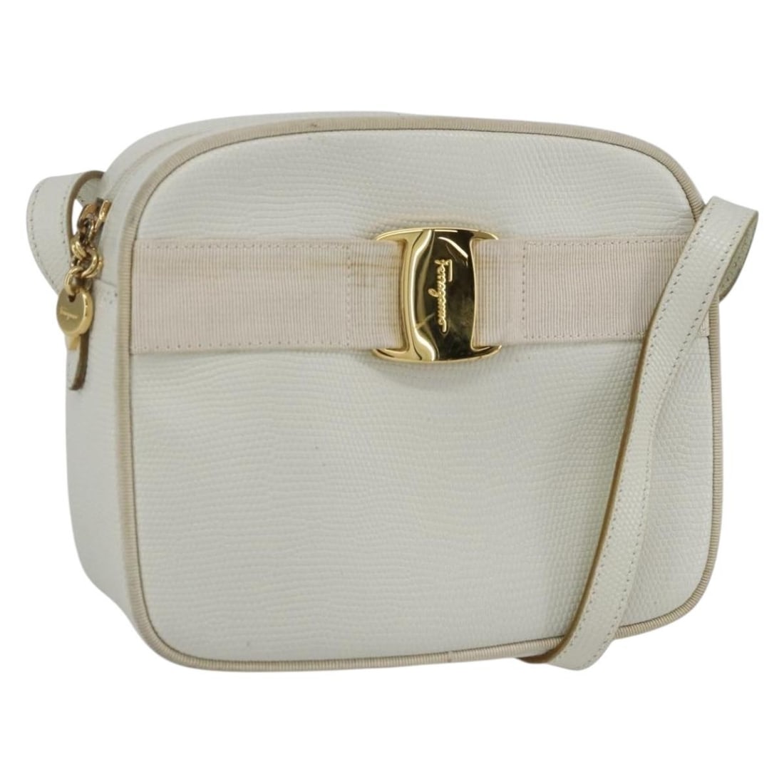 White Leather Vala Shoulder Bag by Salvatore Ferragamo: White Leather Vala Shoulder Bag by Salvatore Ferragamo This Salvatore Ferragamo Vala shoulder bag is crafted from white leather, designed for women. It features a compact silhouette suitable for every