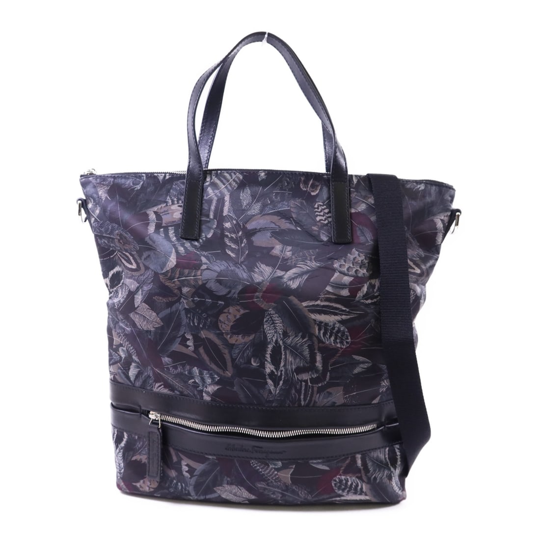 Salvatore Ferragamo Black Nylon Two Way Shoulder and Tote Bag: Salvatore Ferragamo Black Nylon Two Way Shoulder and Tote Bag This Salvatore Ferragamo 2-way shoulder tote bag features a durable black nylon exterior. Made in Italy, it offers versatile carrying opti