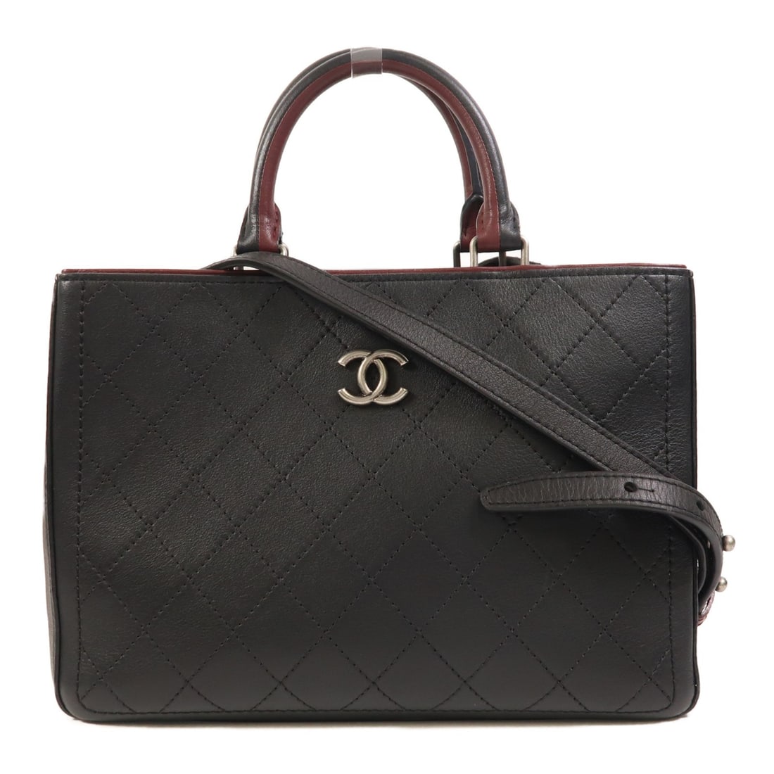 Chanel Black and Red Calfskin 2way Shoulder Bag with Silver Hardware: Chanel Black and Red Calfskin 2way Shoulder Bag with Silver Hardware This CHANEL 2-way shoulder bag is crafted from calfskin leather in black with red accents. The bag features a versatile design, all