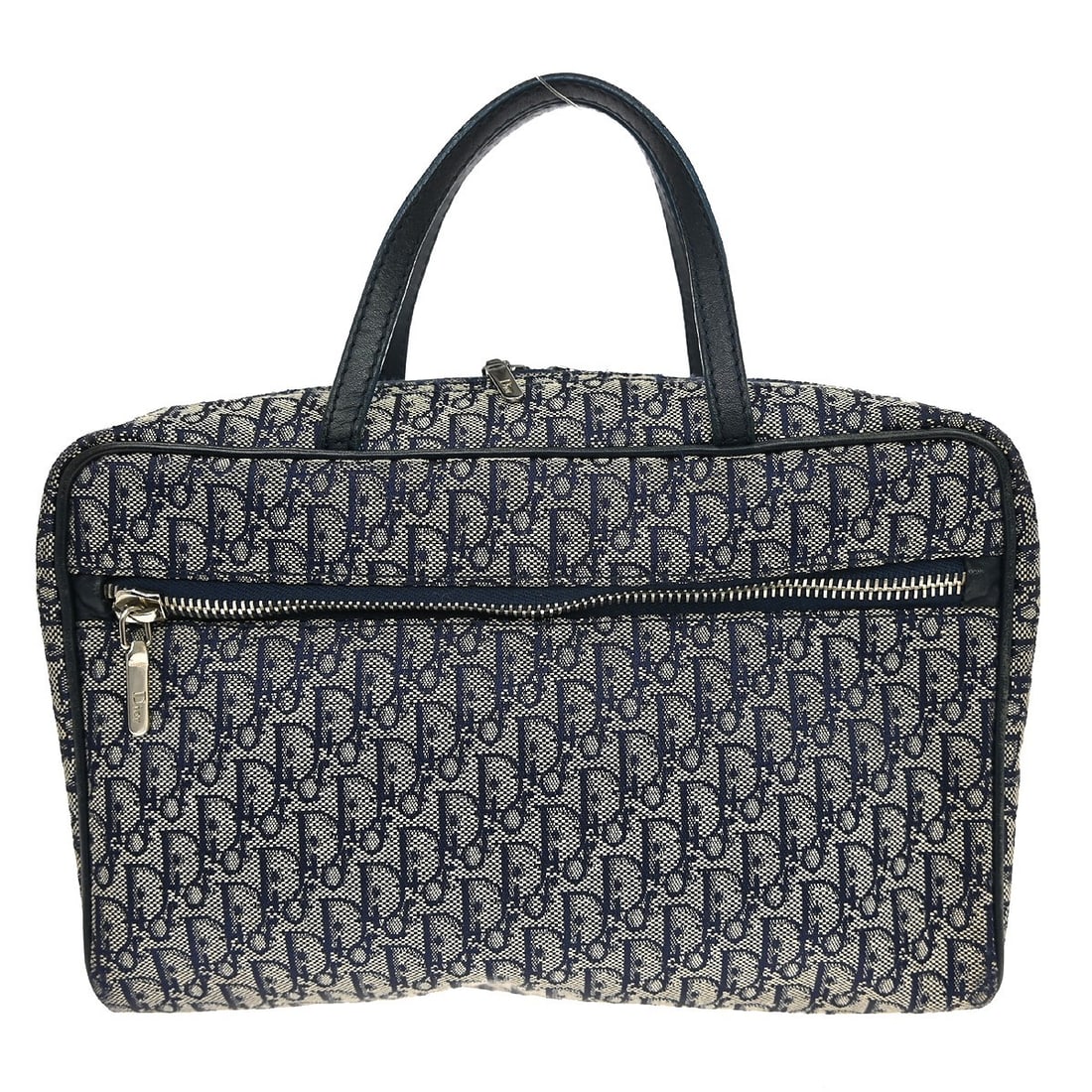 Dior Mini Navy Canvas Top Handle Travel Bag MC0056: Dior Mini Navy Canvas Top Handle Travel Bag MC0056 This Christian Dior navy mini top handle bag is crafted from canvas and features double handles with a 3-inch drop. The bag is equipped with a zip cl