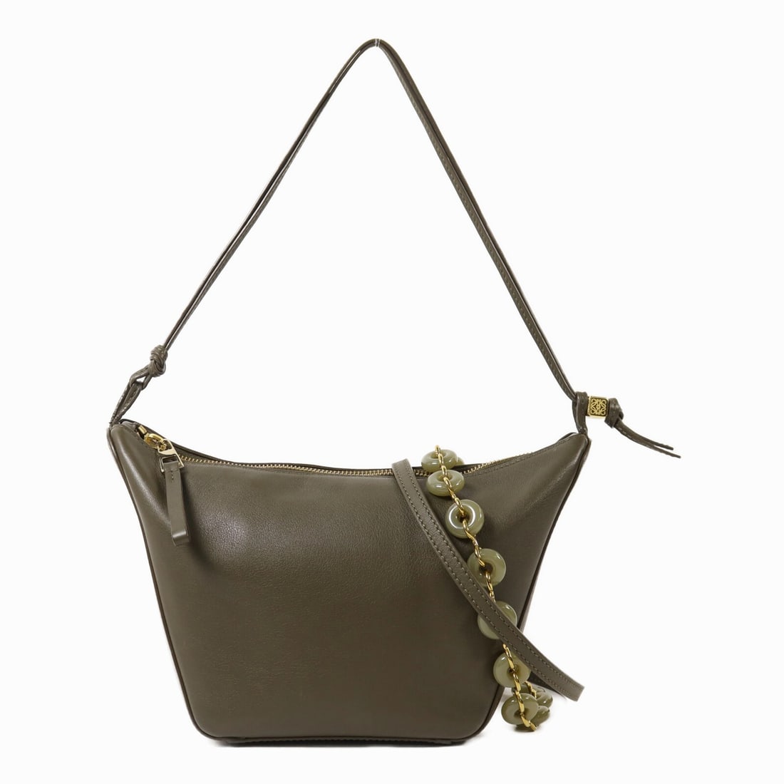 Loewe Mini Hammock Green Calfskin 2-Way Shoulder Bag with Gold Hardware: Loewe Mini Hammock Green Calfskin 2-Way Shoulder Bag with Gold Hardware This LOEWE Mini Hammock Hobo is a versatile 2-way shoulder bag crafted from calfskin leather in green. Designed for women, it fe