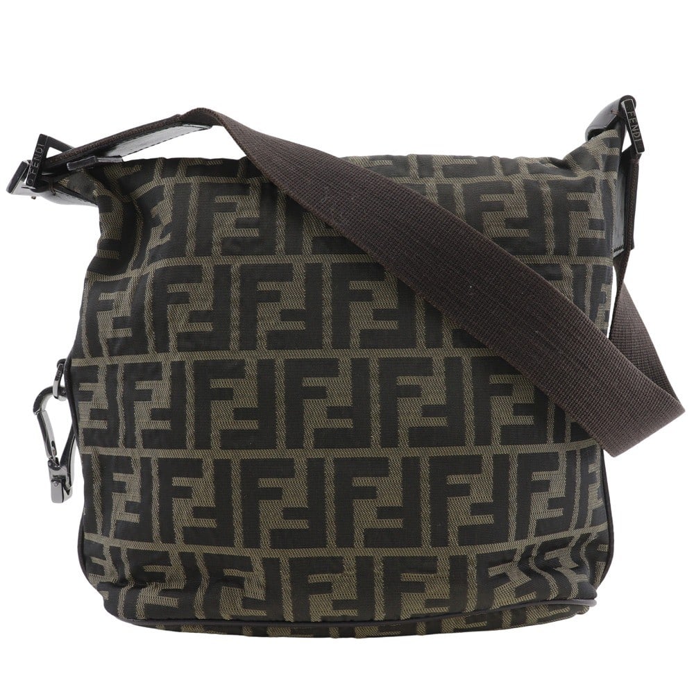 Fendi Zucca Canvas Brown Shoulder Bag Italy 23cm: Fendi Zucca Canvas Brown Shoulder Bag Italy 23cm This Fendi Logo Zucca Shoulder Bag features the iconic Zucca motif in brown canvas. Designed for women, it offers a classic and stylish look. The bag i