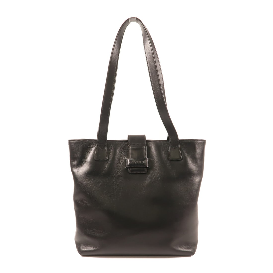 Black Calfskin Leather Vintage Tote by CHANEL CC: Black Calfskin Leather Vintage Tote by CHANEL CC This vintage CHANEL CC tote bag is crafted from black calfskin leather, offering a sophisticated and timeless style. Made in France, the bag features a